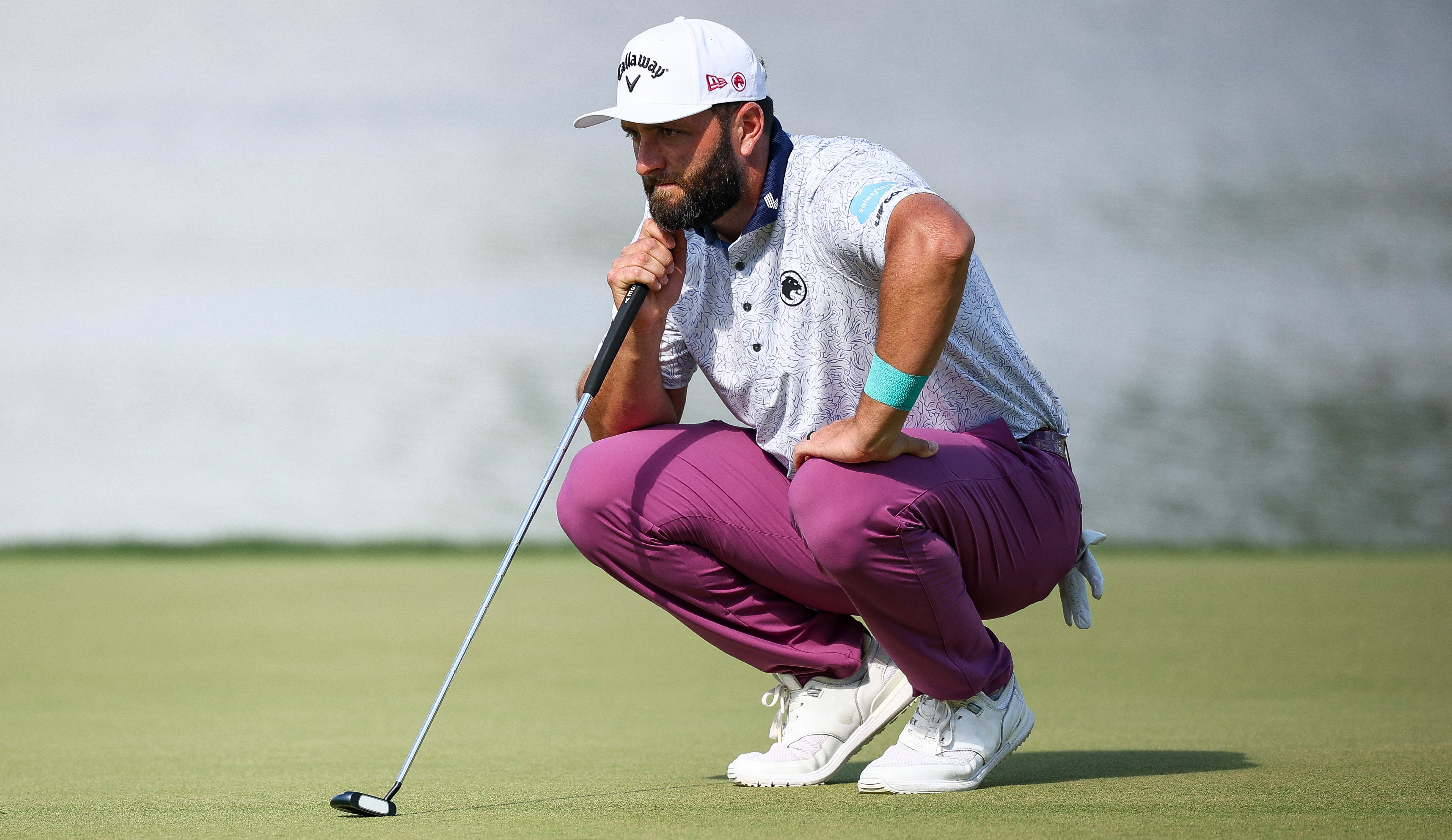 Jon Rahm lining up a putt on the 17th green during the third round of the PGA Championship.