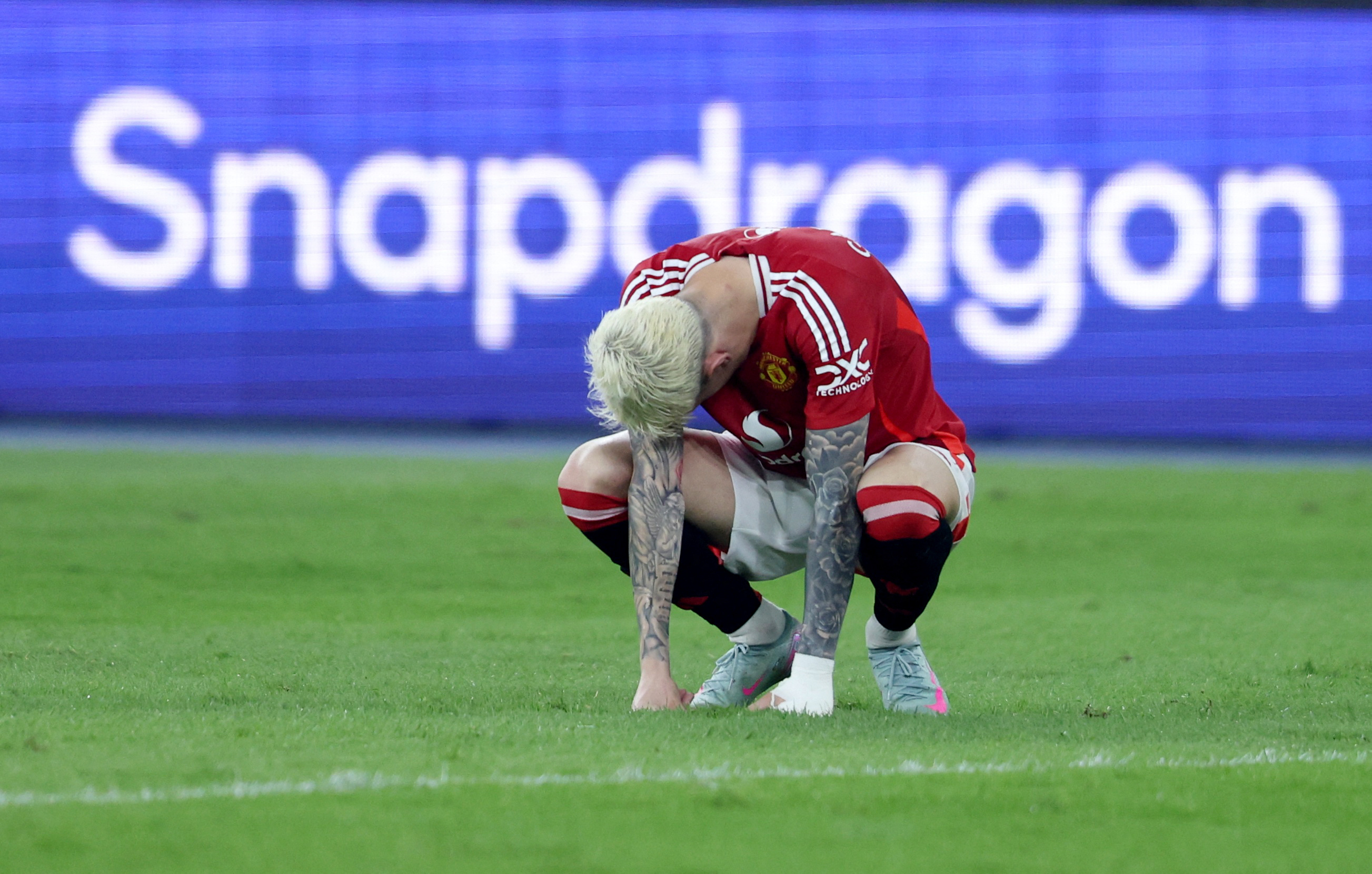 Alejandro Garnacho of Manchester United reacting during a soccer match.